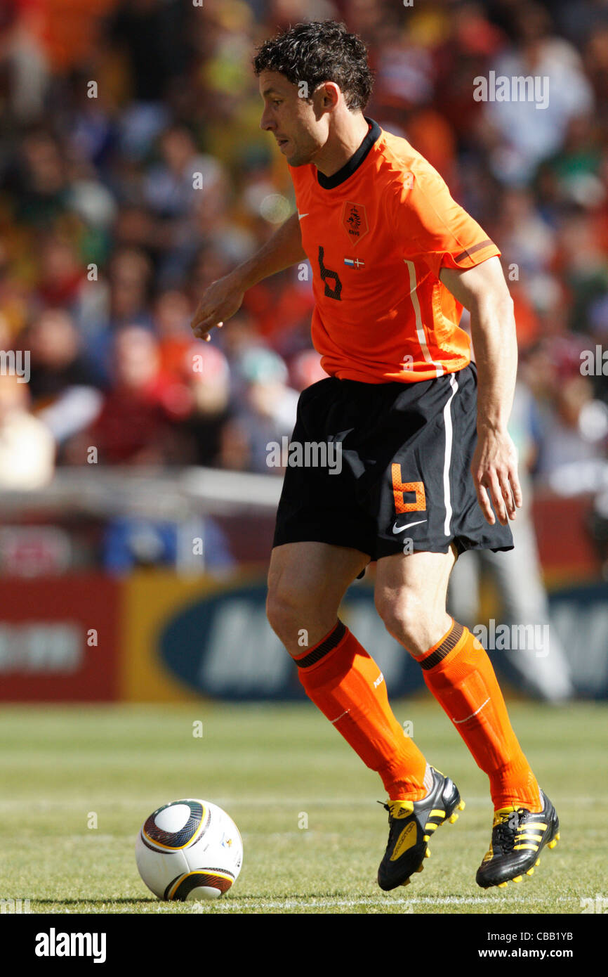 Mark van Bommel of the Netherlands in action during a 2010 FIFA World Cup  match against Denmark at Soccer City Stadium Stock Photo - Alamy