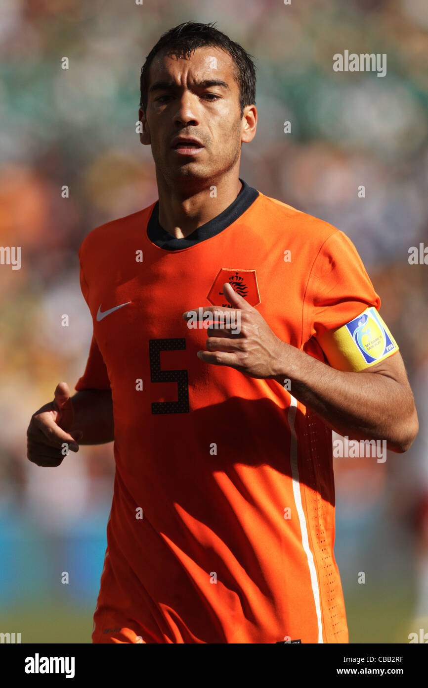 Giovanni van Bronckhorst of the Netherlands in action during a 2010 FIFA World Cup match against Denmark at Soccer City Stadium. Stock Photo