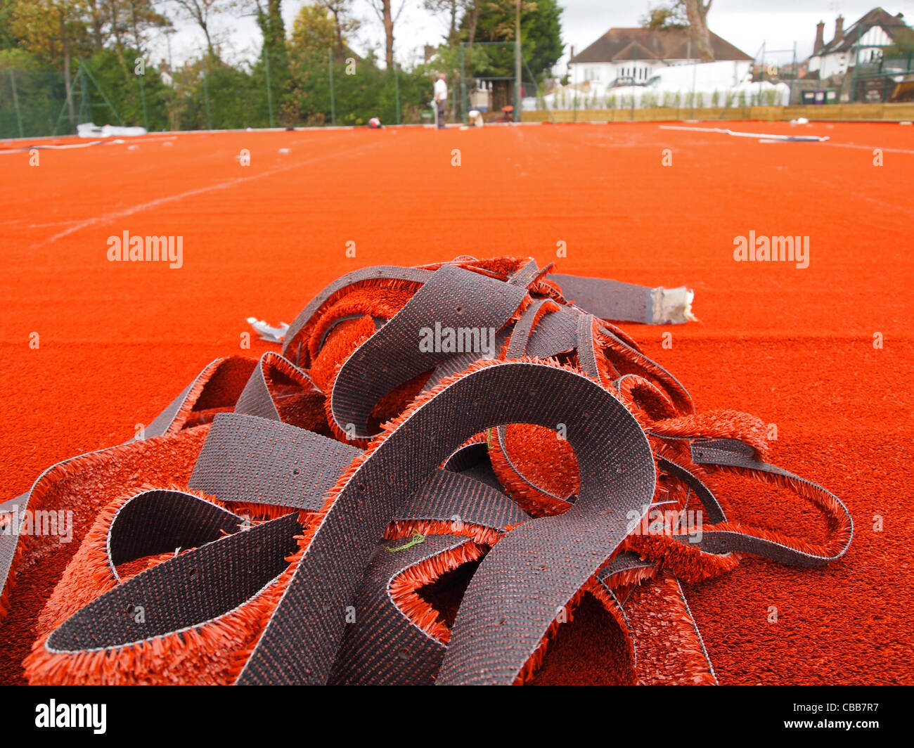 Construction of synthetic clay tennis courts - left-over trimmings of the stability mat Stock Photo