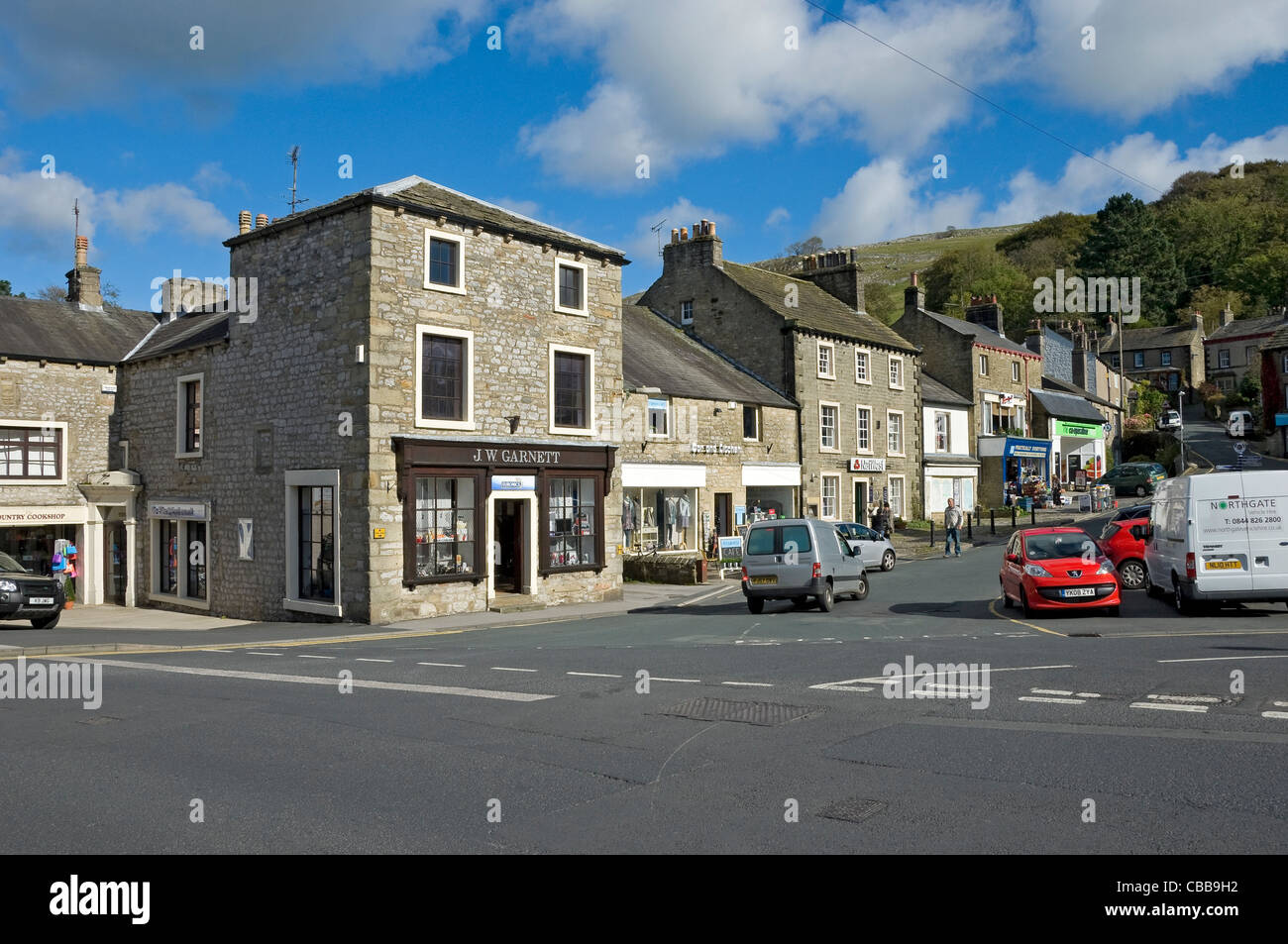 Shops stores in the Market Place Settle Yorkshire Dales National Park North Yorkshire England UK United Kingdom GB Great Britain Stock Photo