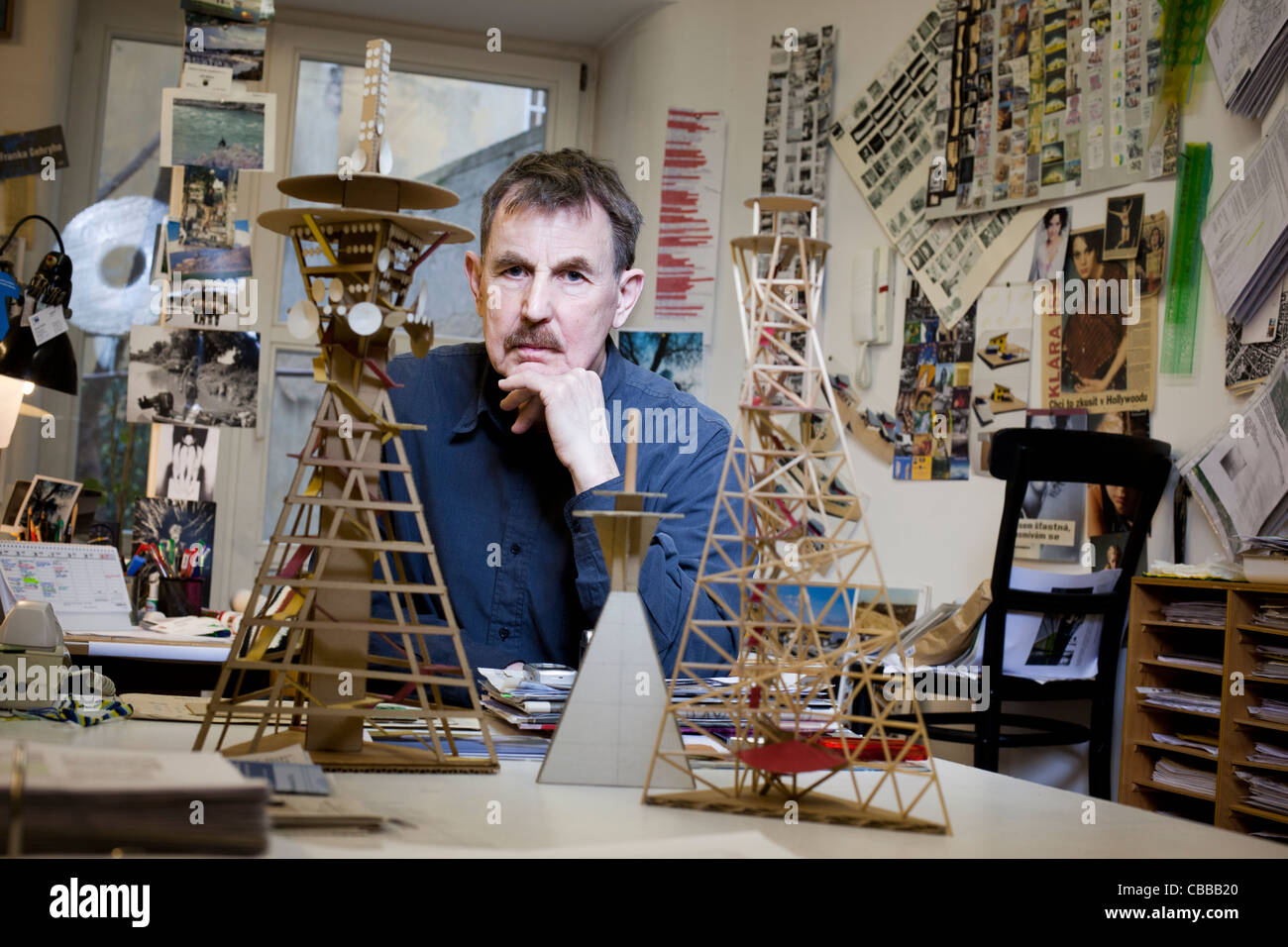 Czech architect of Croatian origin Vlado Milunic poses with architectural models in his Studio VM in Prague, Czech Republic. Stock Photo