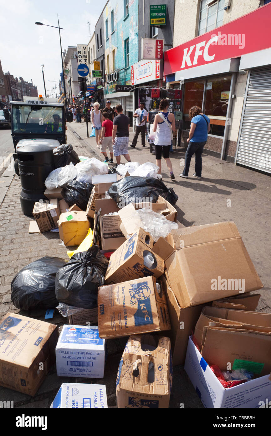 England, London, Rubbish Awaiting Collection on Pavement Stock Photo