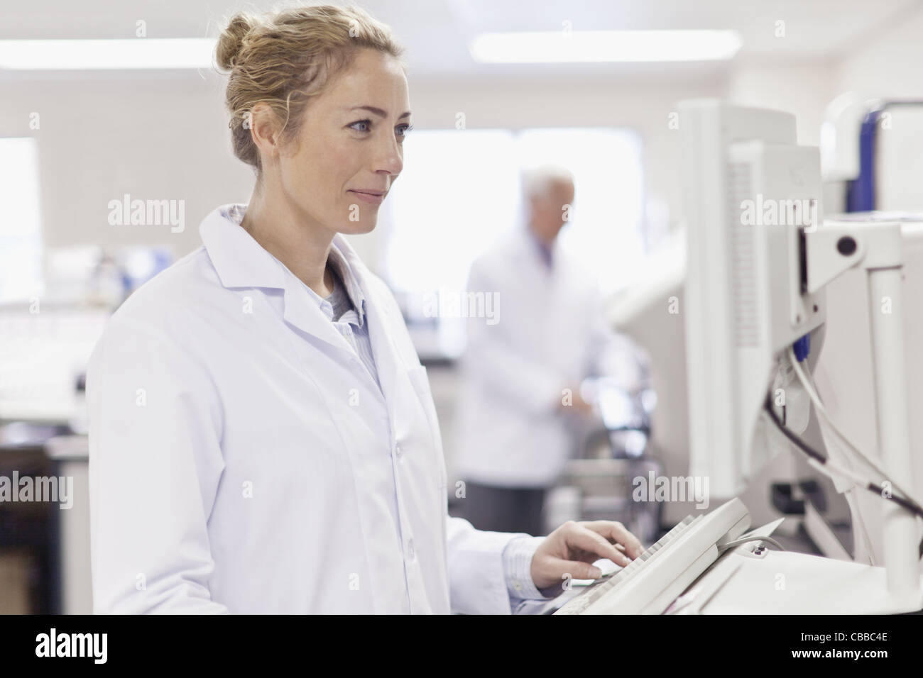 Scientist working in pathology lab Stock Photo