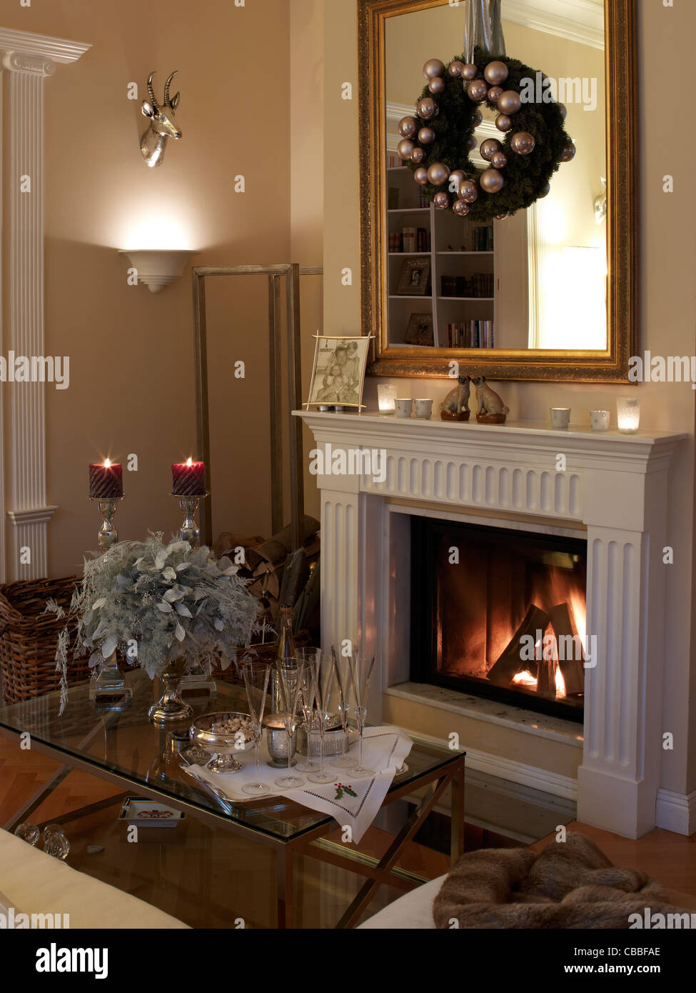 Christmassy decorated fireplace Stock Photo