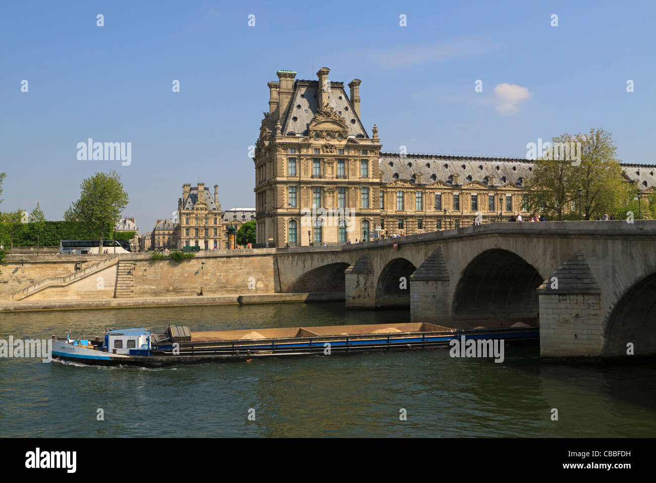 Louvre and Pont Royal, Paris. The Pont Royal is the third-oldest bridge in Paris, crossing the Seine by the Pavillon de Flore. Stock Photo