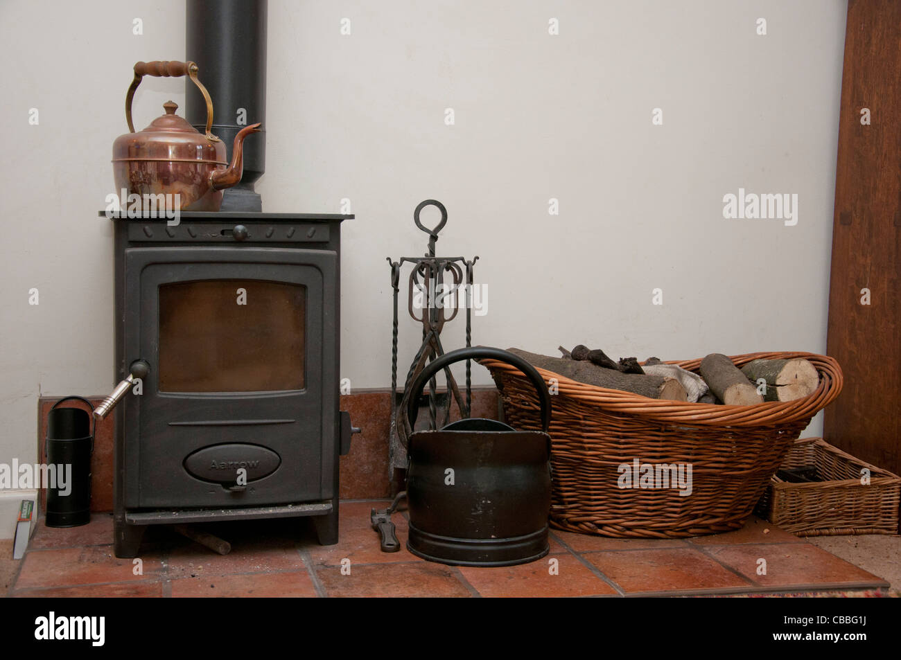 Solid fuel stove woodburner fireplace. Stock Photo