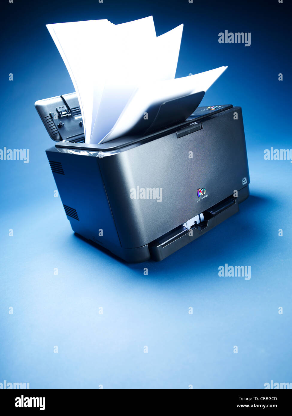 Printer with paper flying out Stock Photo