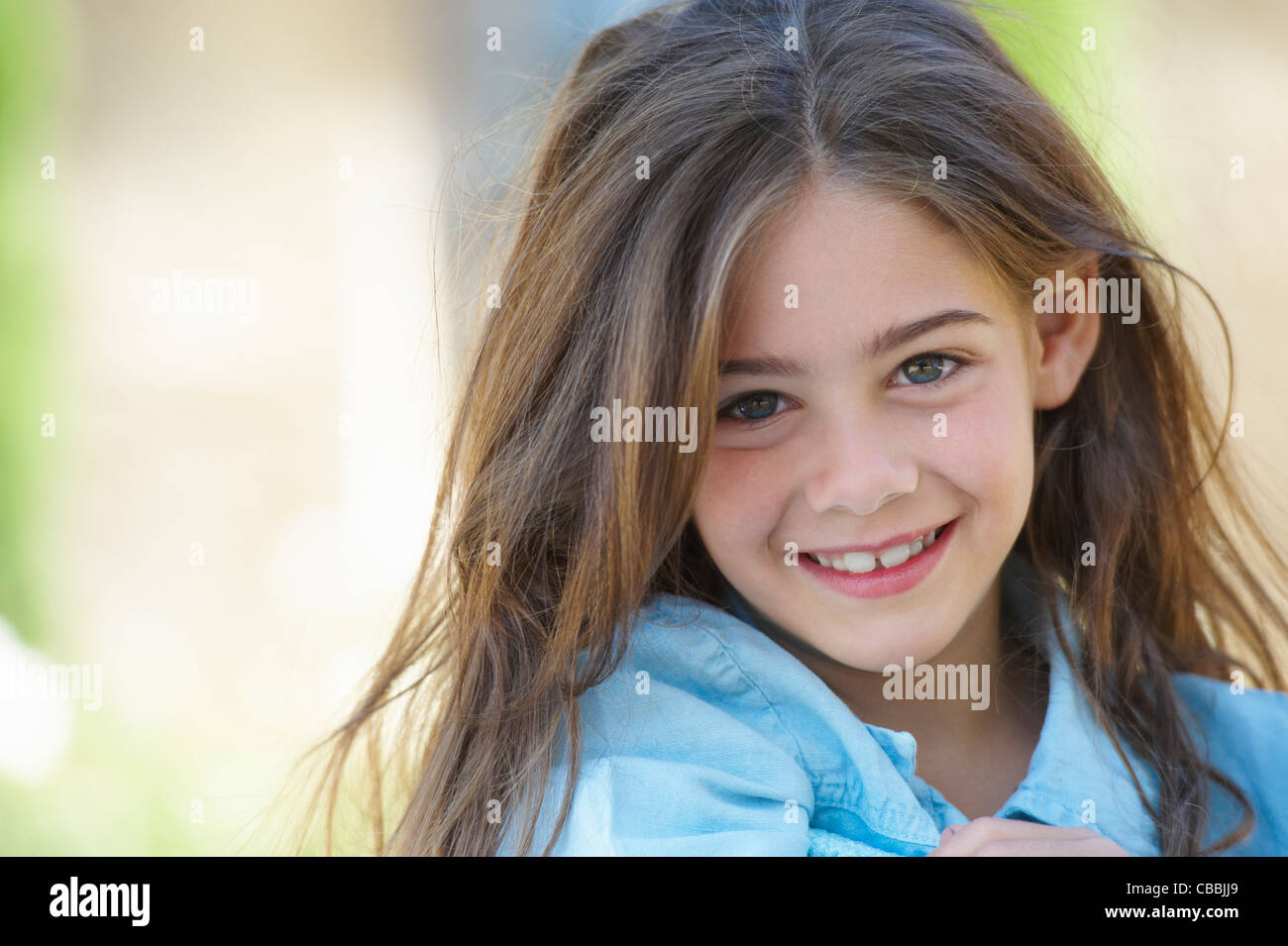 Close up of girl’s smiling face Stock Photo