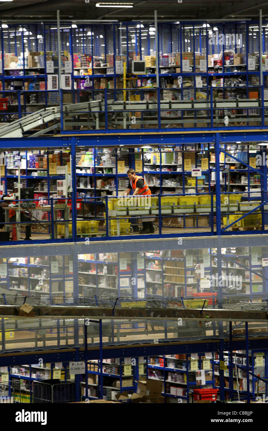 WORKERS SORTING CHRISTMAS PRESENTS AT THE AMAZON WAREHOUSE IN MILTON