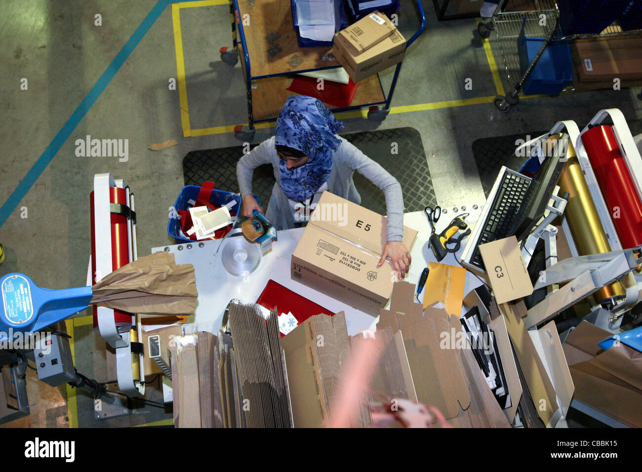 Amazon boxes in warehouse hi-res stock photography and images - Alamy