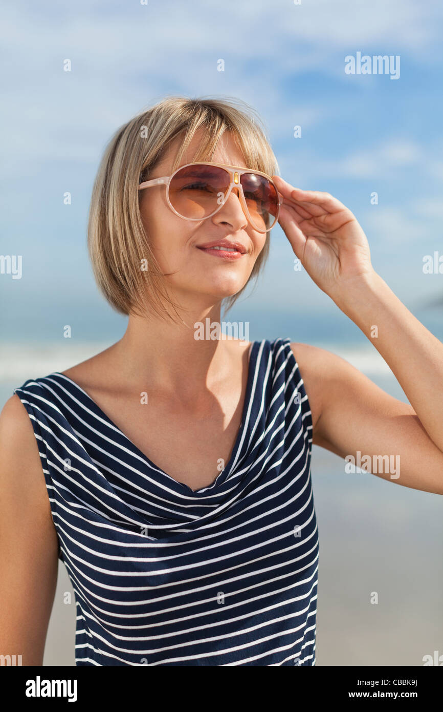 Female adult wearing sunglasses hi-res stock photography and images - Alamy