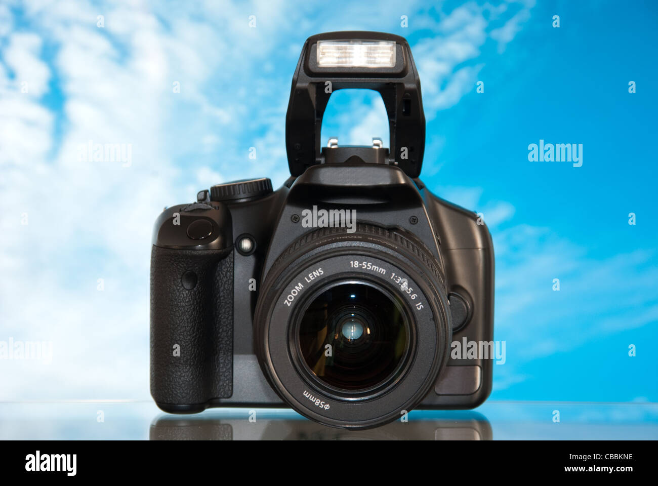 Dslr camera isolated on sky background with reflection Stock Photo - Alamy