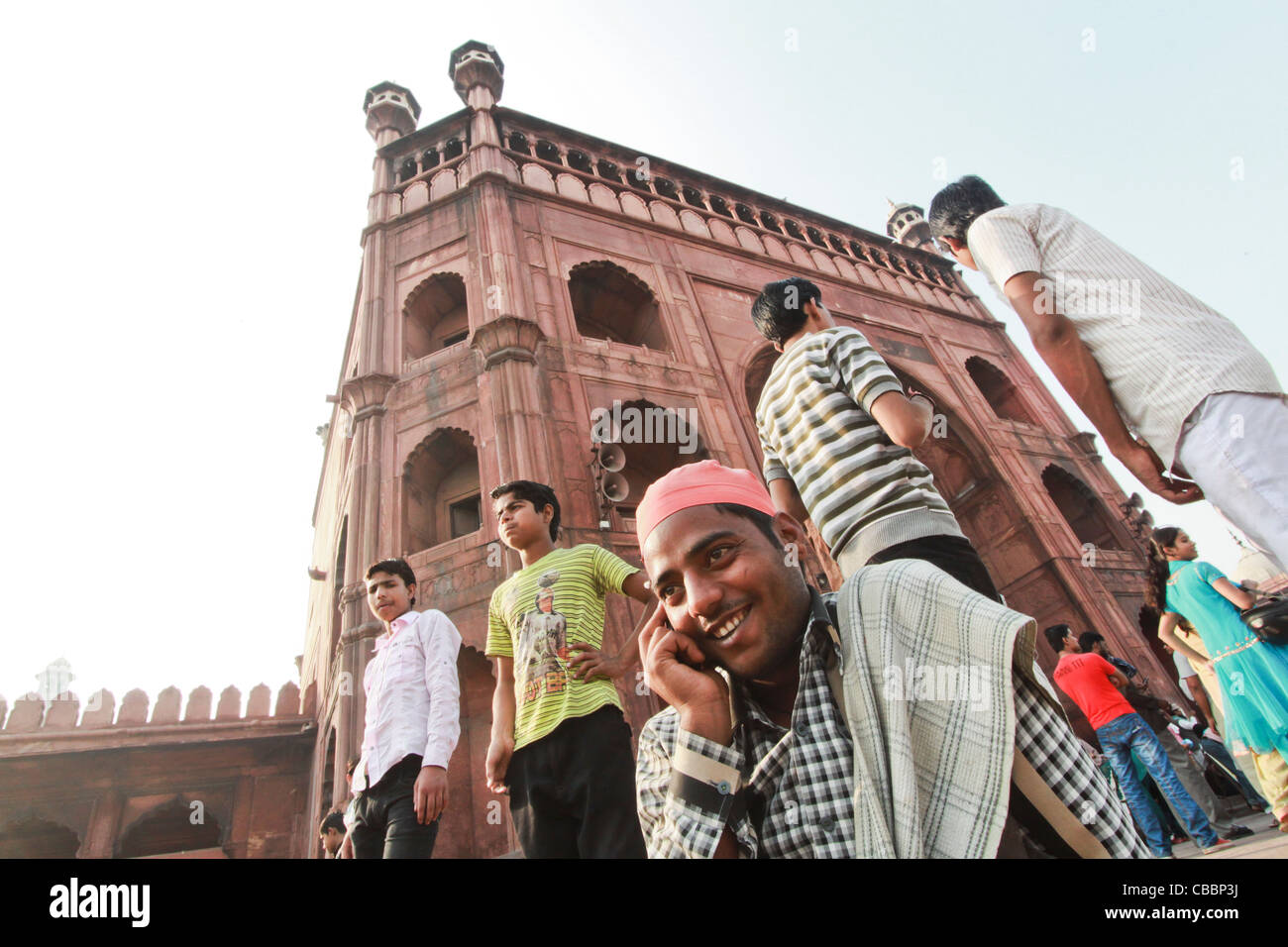 Muslim boy talking on phone Stock Photo