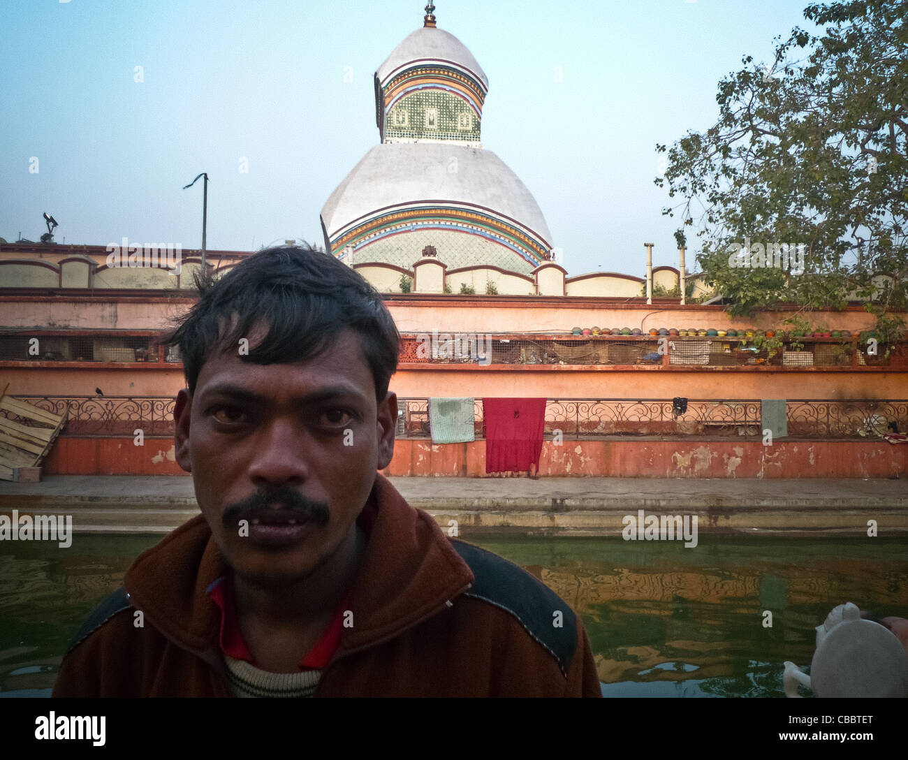 Kolkata city of Faith, Kalighat Kali Temple dawn portrait of a man who