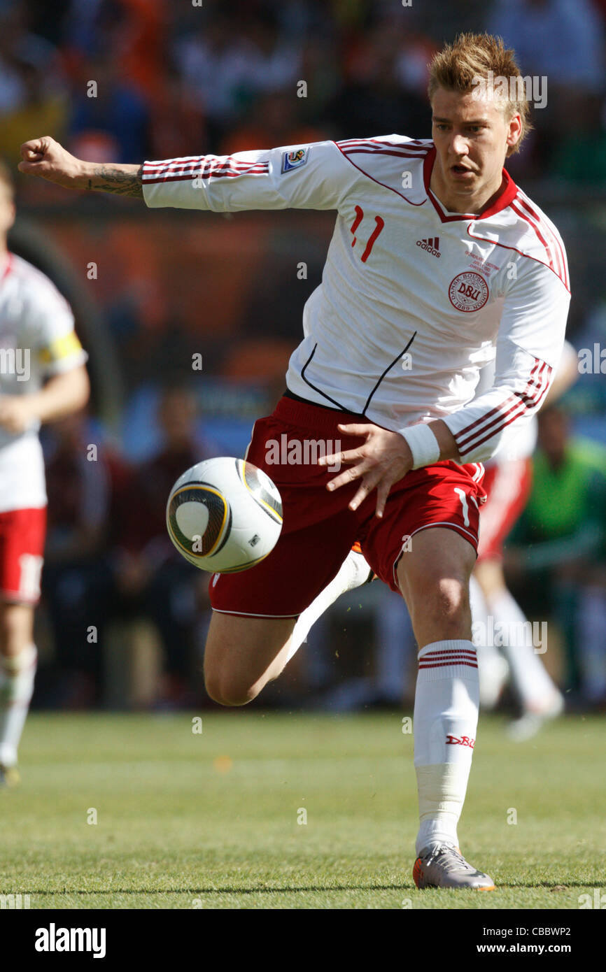 Nicklas Bendtner of Denmark in action during a 2010 World Cup match against the Netherlands at Soccer City Stadium. Stock Photo