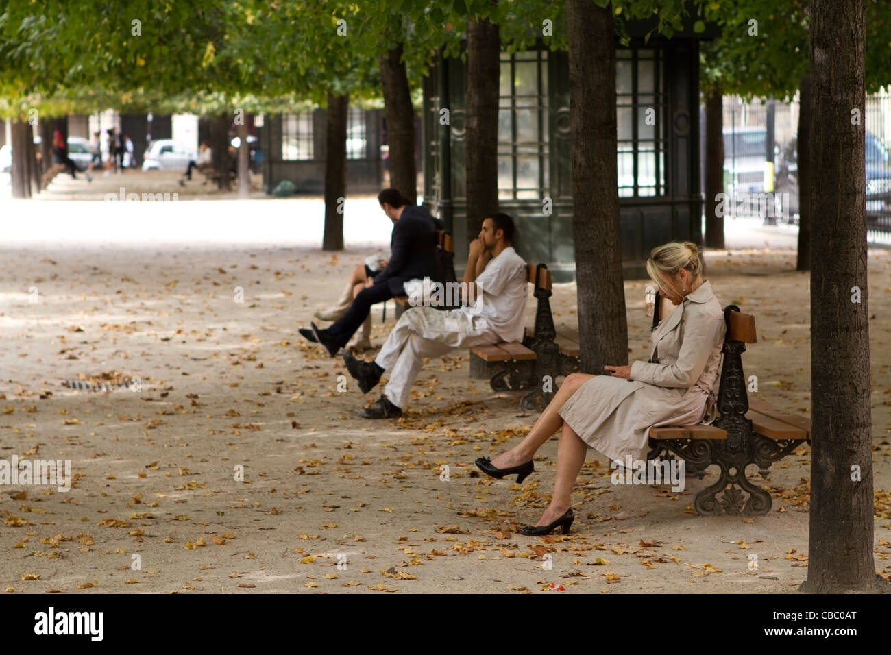 Locals relaxing in Place des Vosges, Paris, France Stock Photo