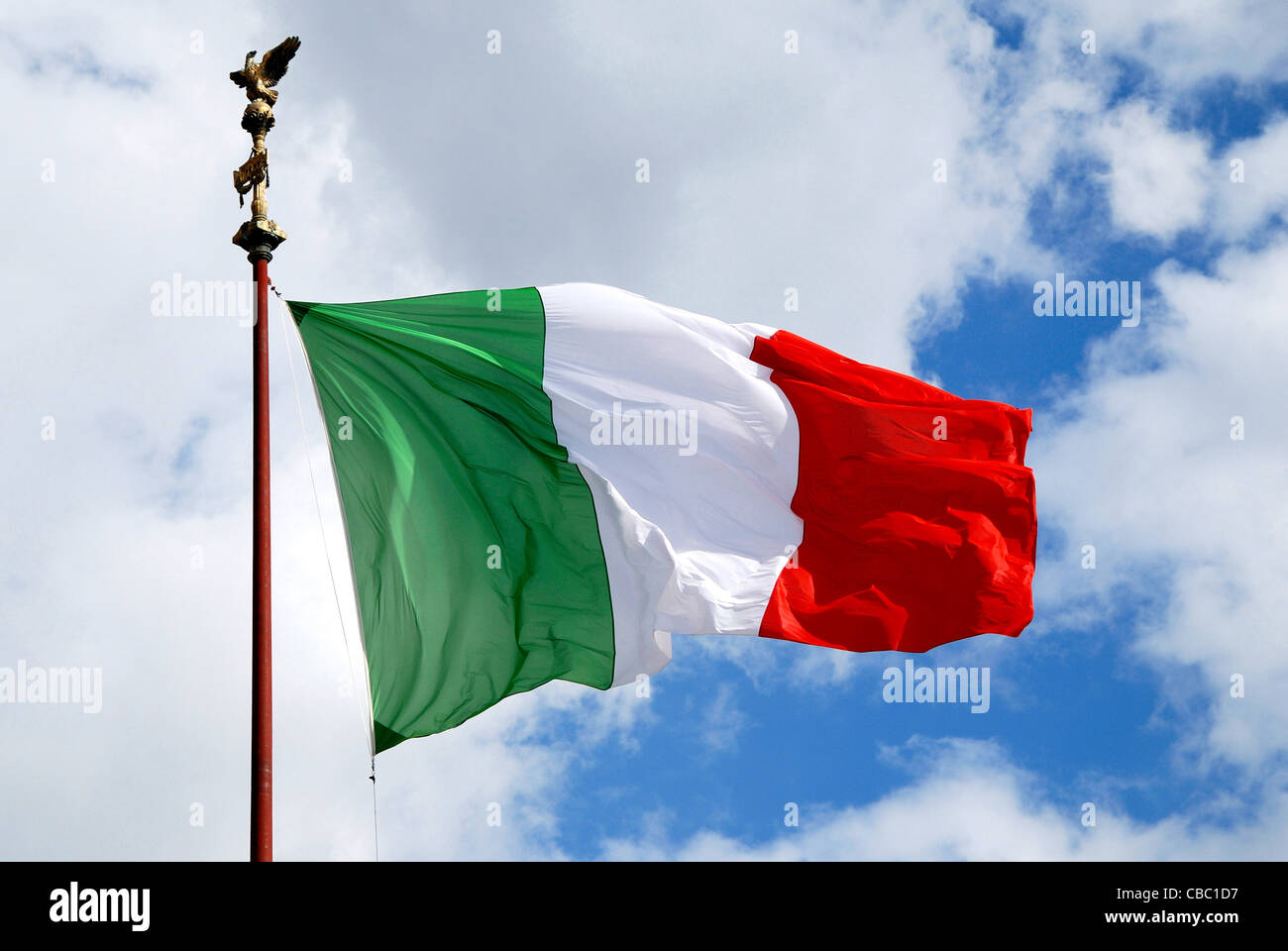 Italian flag at the National monument to king Viktor Emanuel II. and monument of the unknown soldier in Rome. Stock Photo