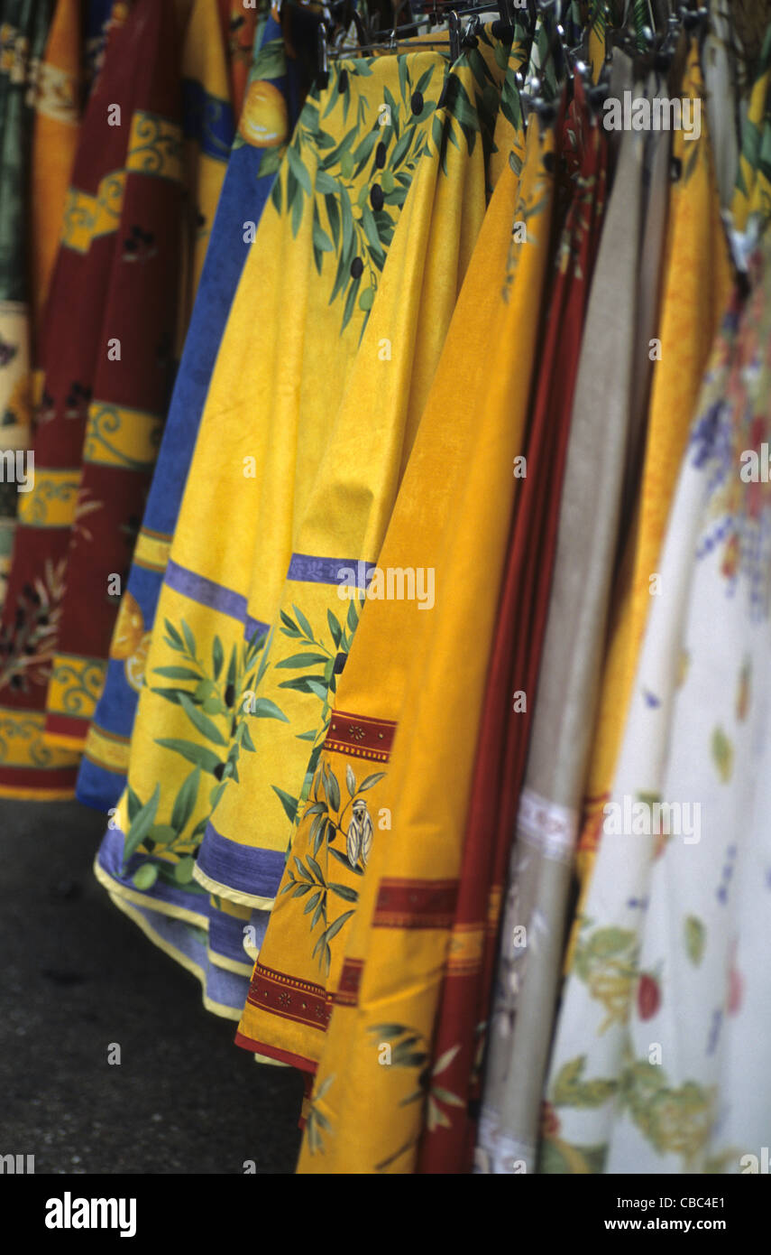 Traditional Provencal textiles in a market stall, Arles, France Stock Photo