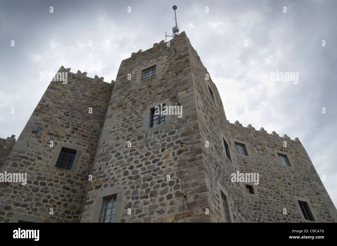 Dark clouds above the castle like Monastery of St John the Theologian, Chora, Patmos Island, Greece Stock Photo