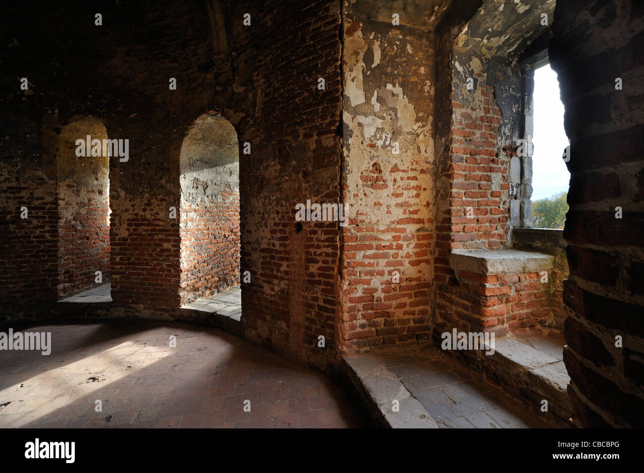 Room with stone window seat in recess inside medieval Beersel Castle, Belgium Stock Photo