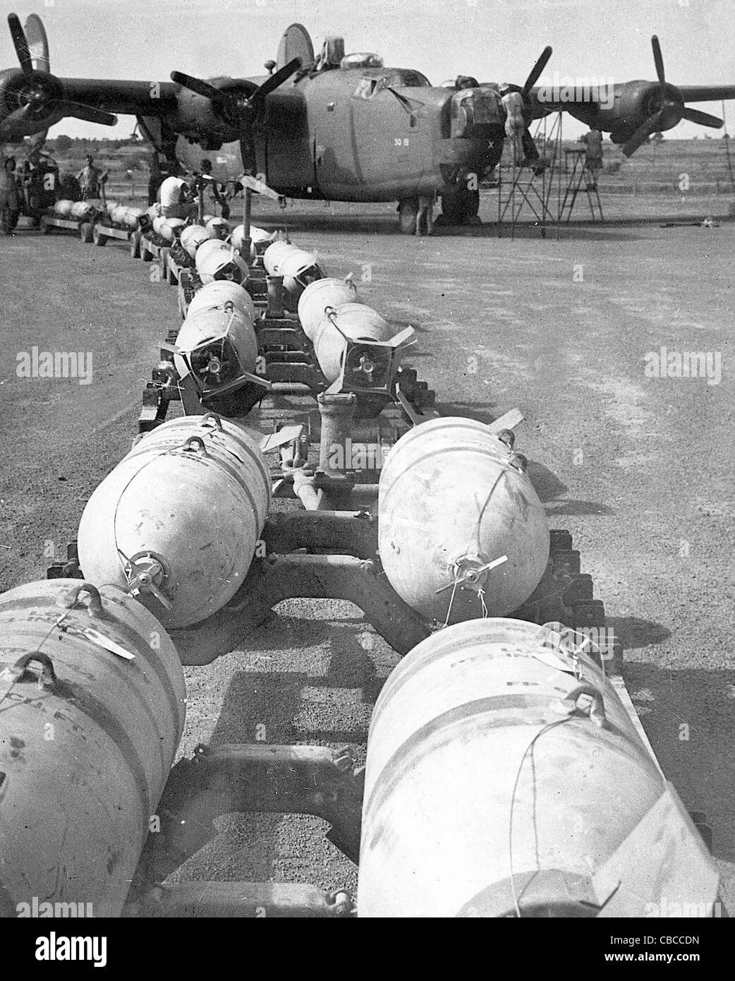 A B24 Liberator bomber is loaded up prior to a mission Stock Photo