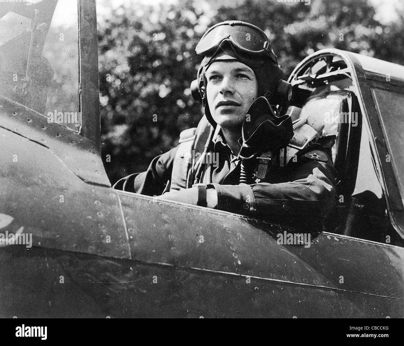 P47 Thunderbolt pilot of the USAAF sits in his aircraft cockpit during WW11 Stock Photo