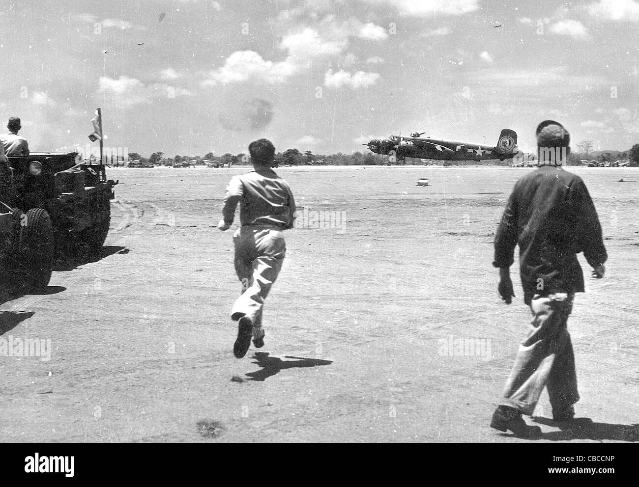 A plane hits the runway with wheels up during an emergency landing in