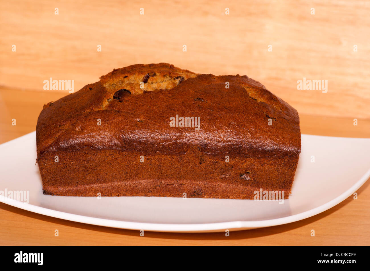 Home Baking Fresh Home Made Baked Cooked Banana Cake On A White Plate Stock Photo