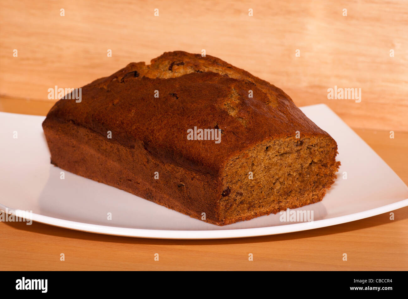 Home Baking Fresh Home Made Baked Cooked Banana Cake On A White Plate Stock Photo
