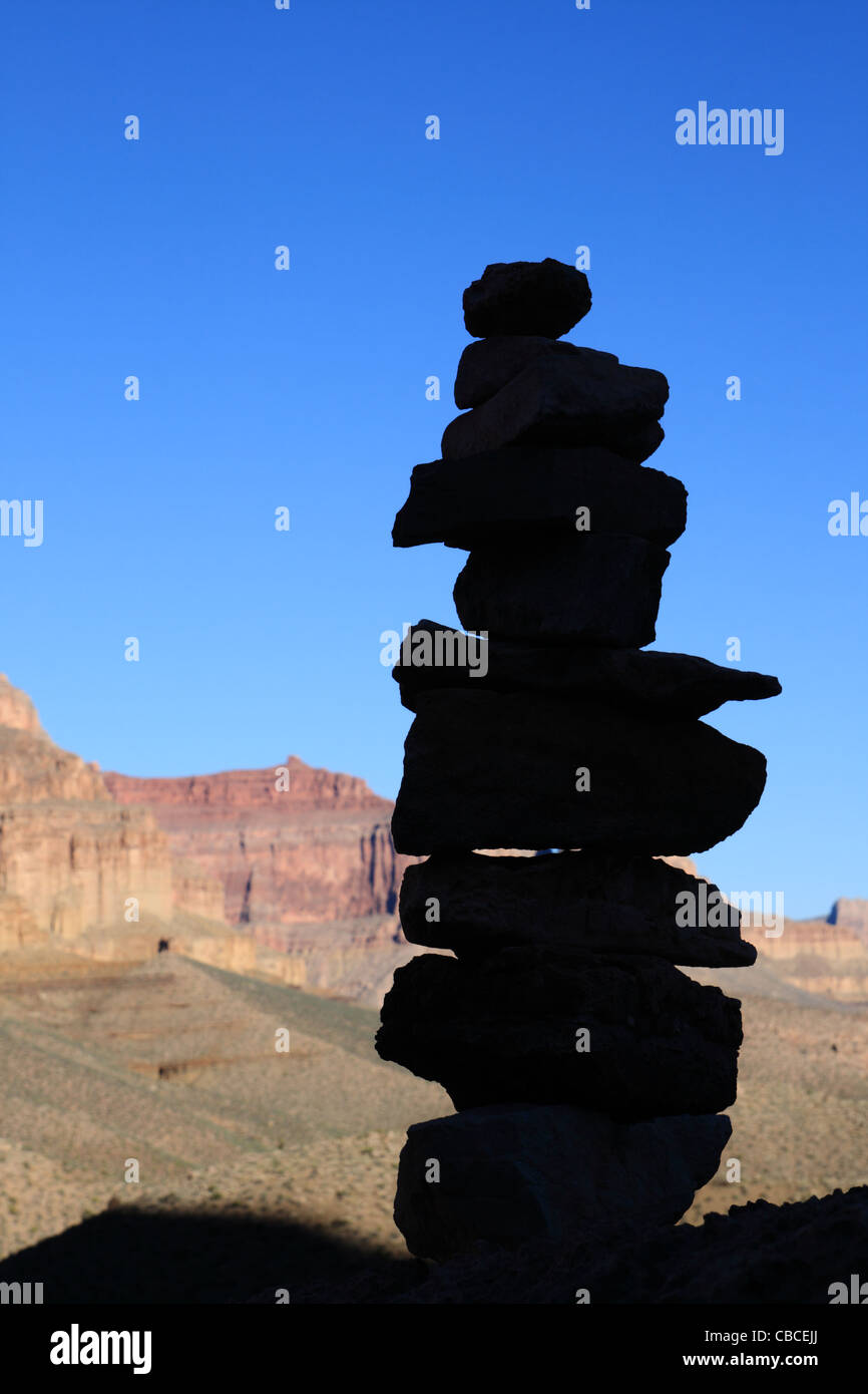 rock cairn silhouette along the Tonto Trail in the Grand Canyon Stock Photo