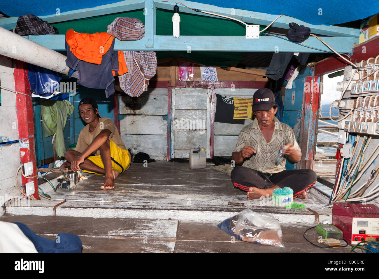 Fishermen living on Fishing Platform called Bagan, Cenderawasih Bay, West Papua, Indonesia Stock Photo