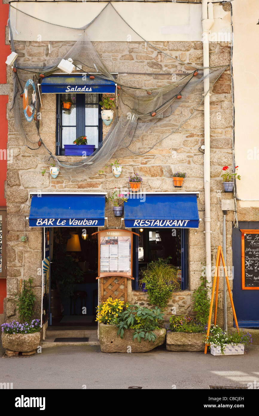 Old bar restaurant in the seaside town of Concarneau, Finistere, Brittany, France Stock Photo