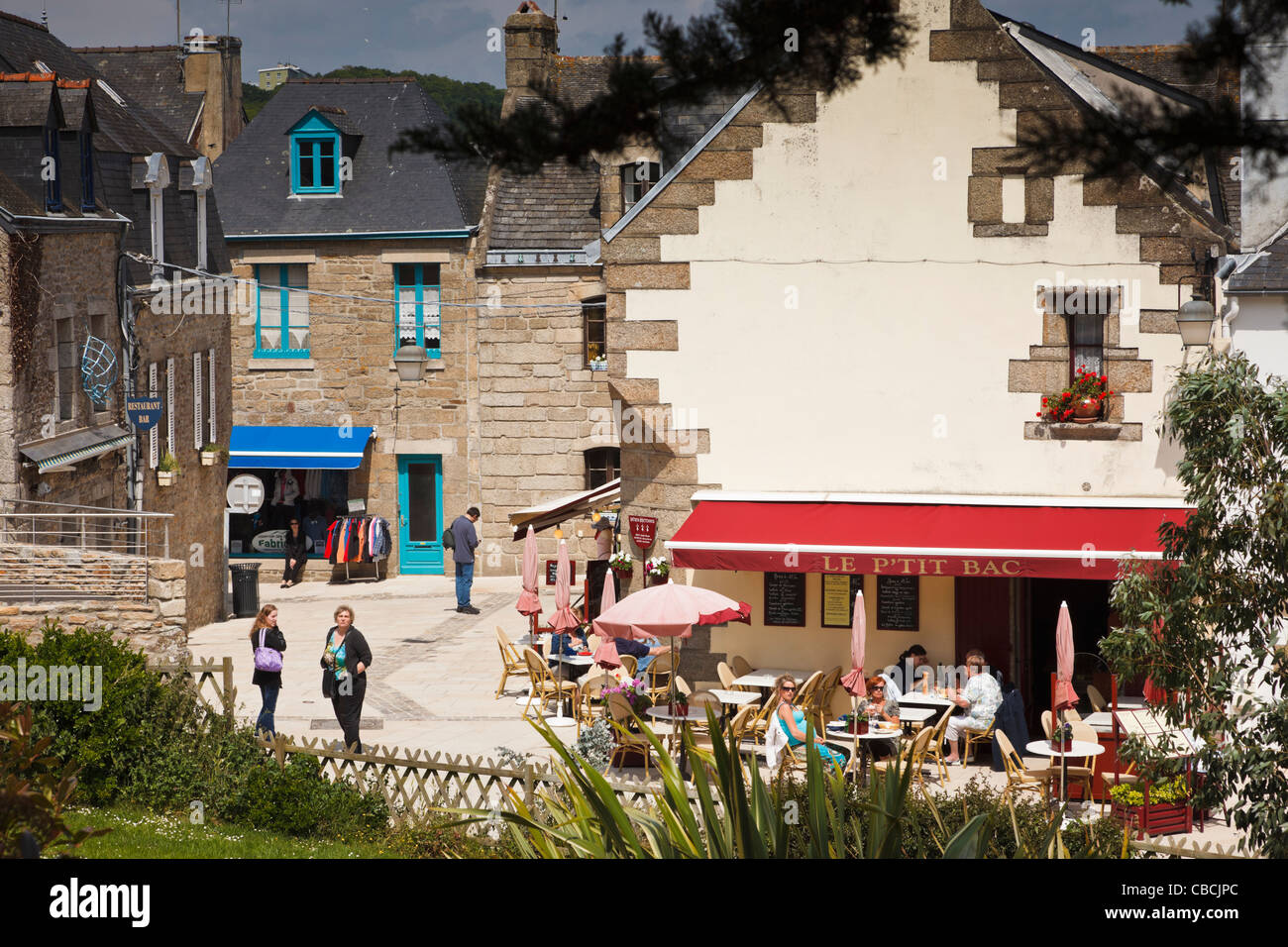 People relaxing in Concarneau, Finistere, Brittany, France Stock Photo