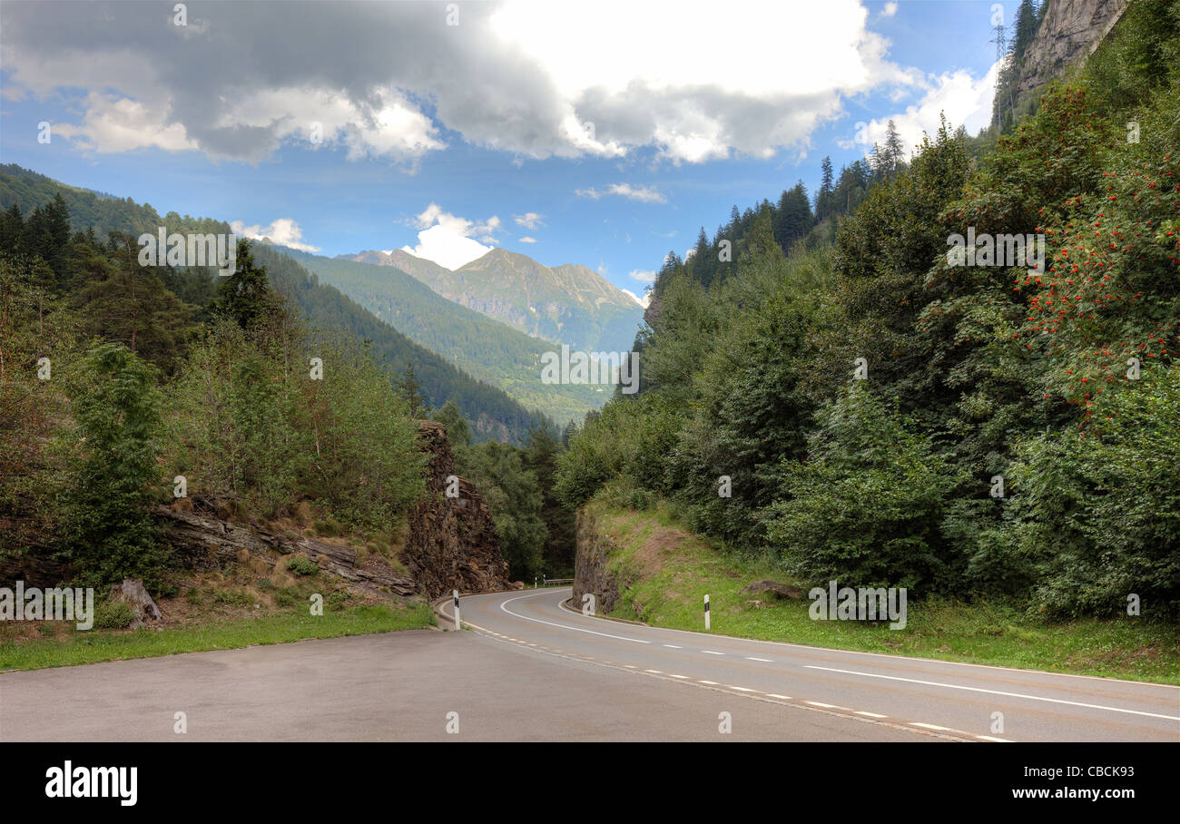 Empty picturesque road in swiss Alps, Europe. Stock Photo