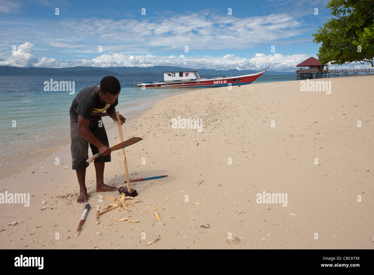 Native carving spare part of Outrigger Boat, Cenderawasih Bay, West Papua, Indonesia Stock Photo