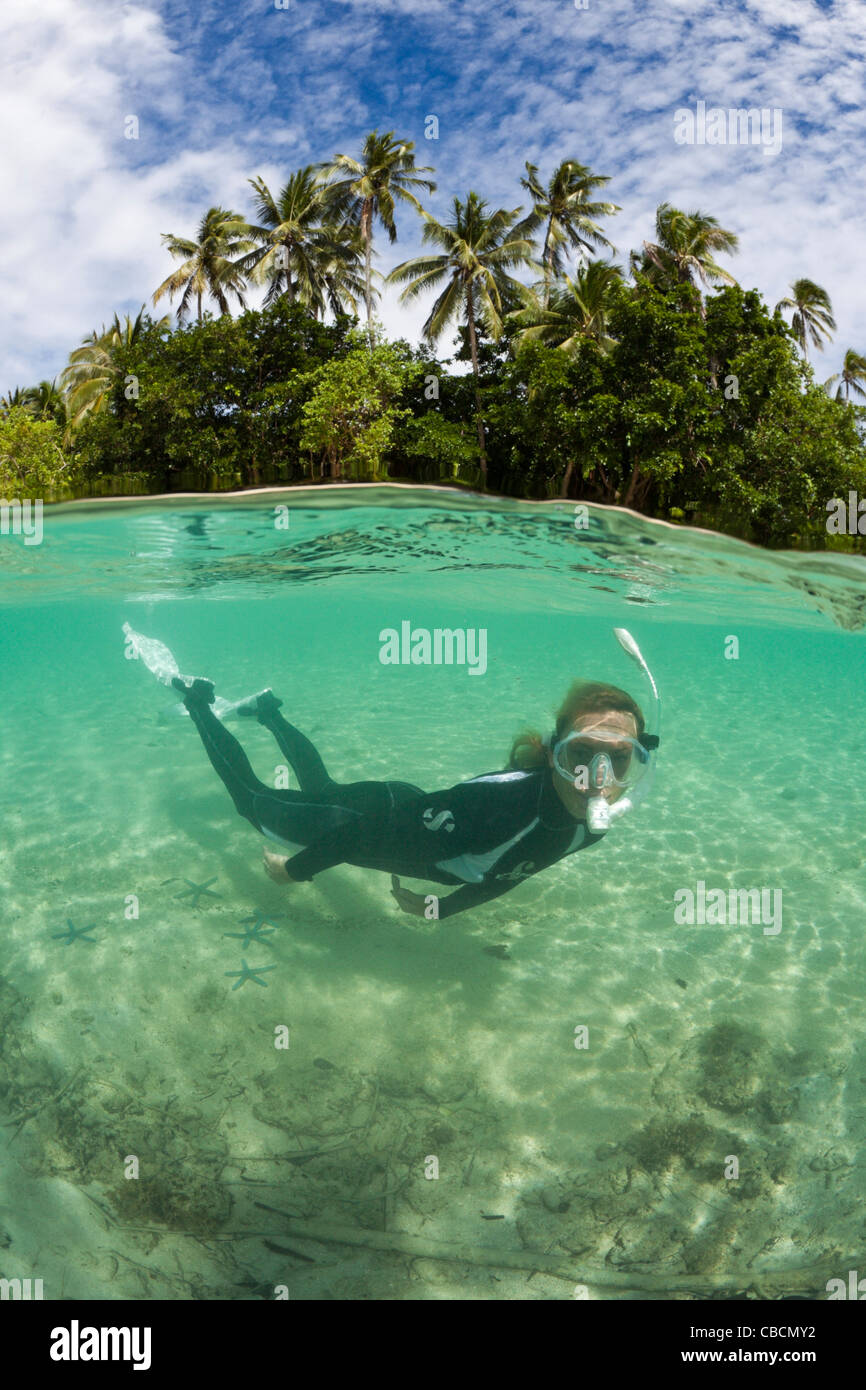 Snorkeler and tropical island hi-res stock photography and images - Alamy