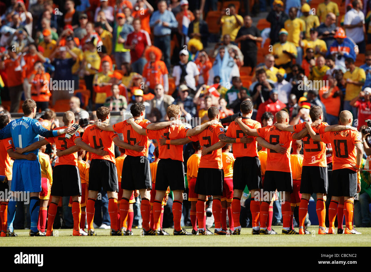 Netherlands players line up for team introductions before a 2010 FIFA World Cup match against Denmark at Soccer City Stadium. Stock Photo