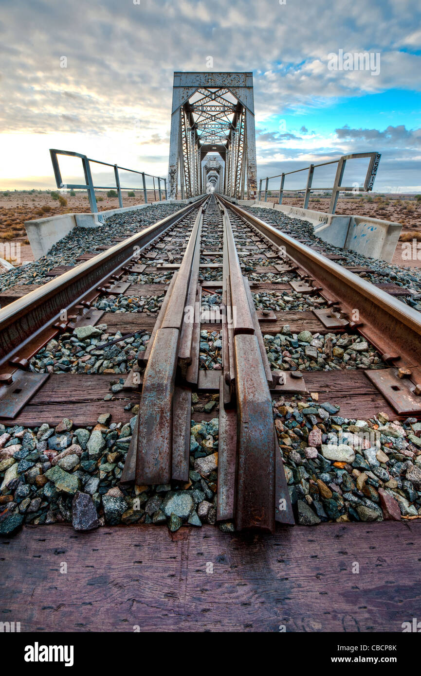 German text Streik (meaning strike) over rusty metal railway tracks and  brackets in a ballast bed, selected focus, narrow depth of field Stock  Photo - Alamy