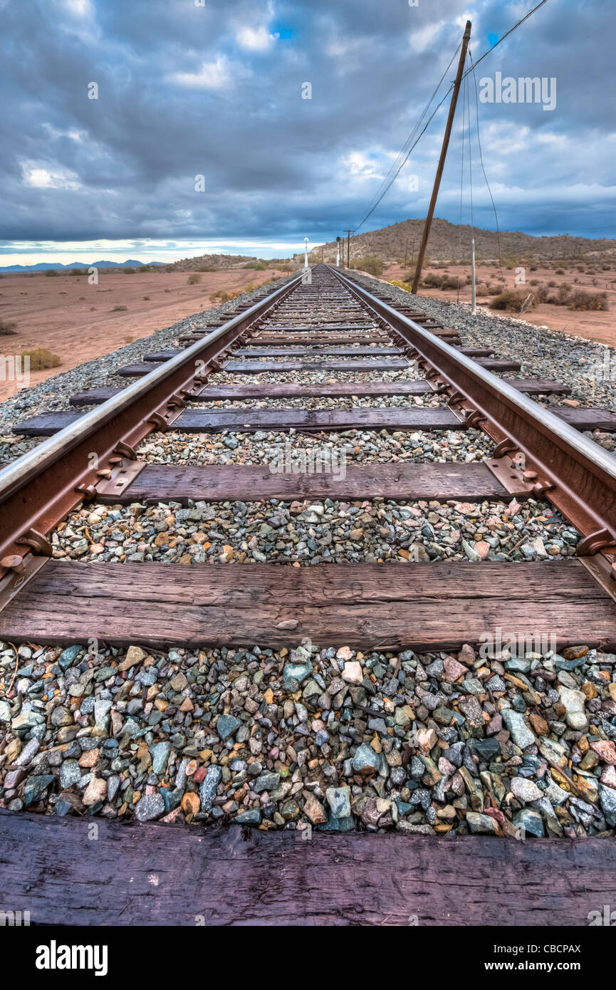 View of these wide train tracks north of Coolidge, Arizona. Still in use by the BNSF. Stock Photo