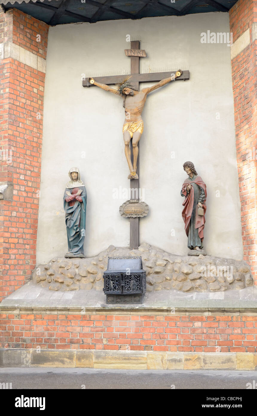 Crucifix on wall Stock Photo Alamy