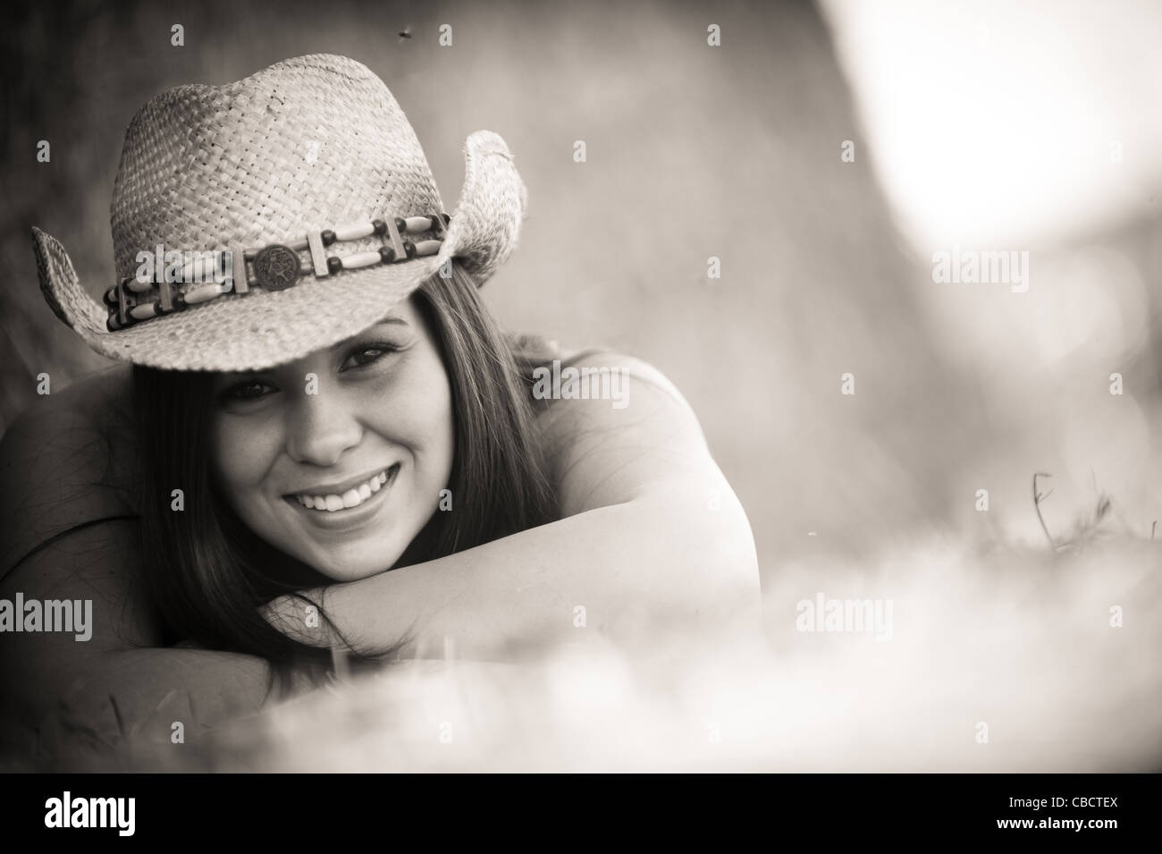 Young girl with a cowboy hat Stock Photo - Alamy