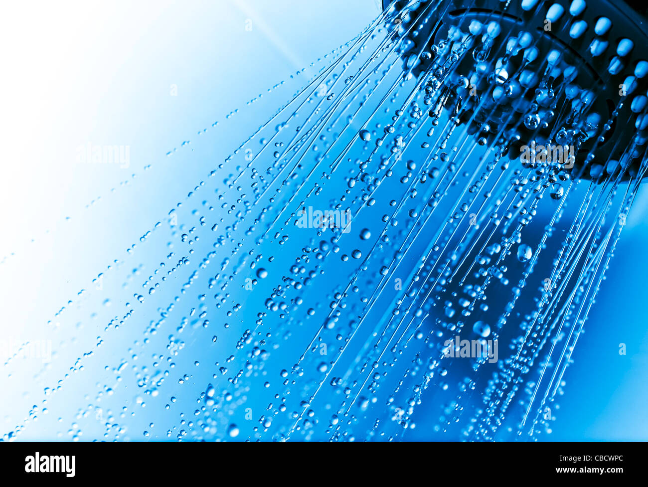 Shower head with running water showing drops Stock Photo Alamy
