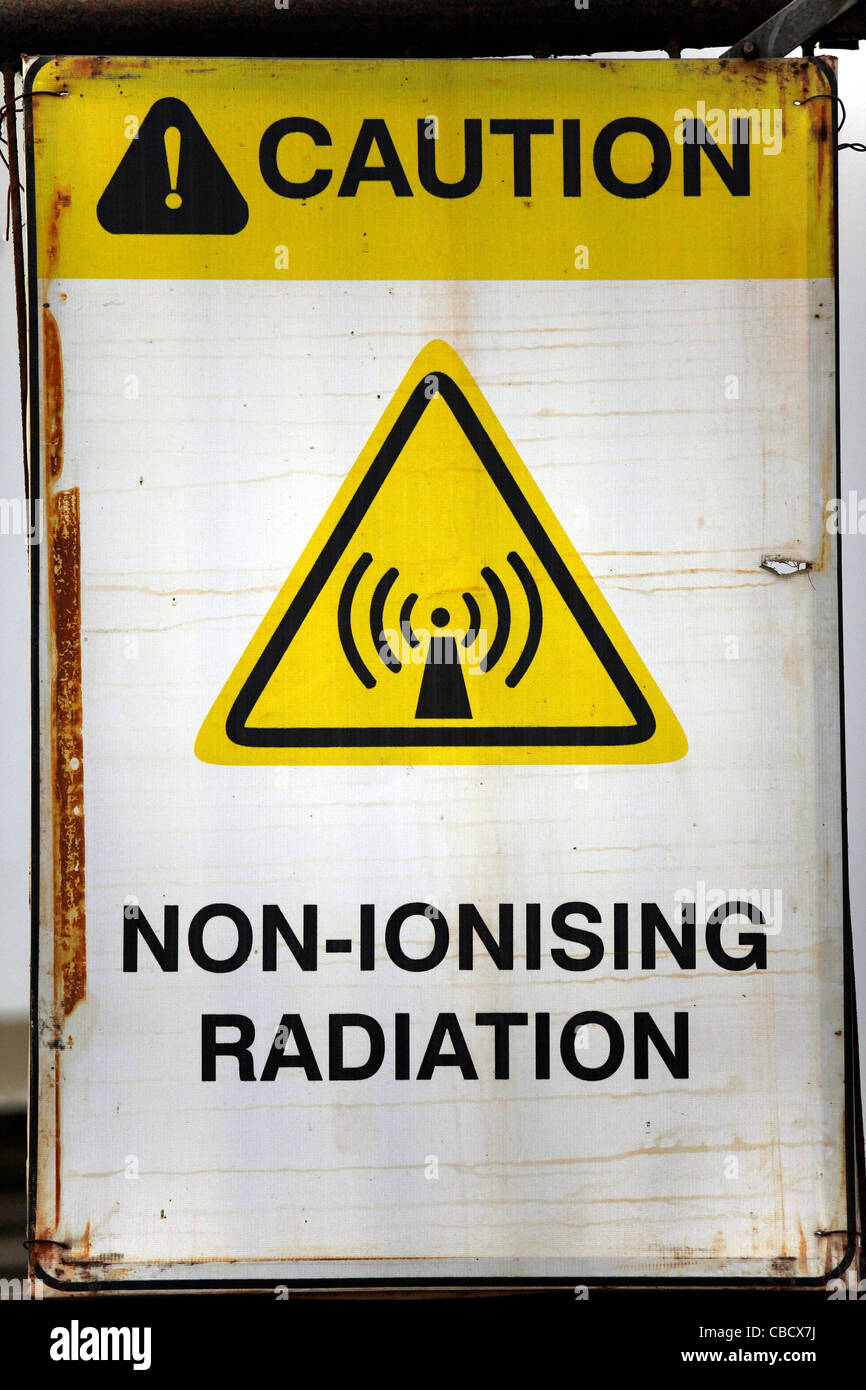 caution threat non-ionising radiation health-risk notification placard Stock Photo