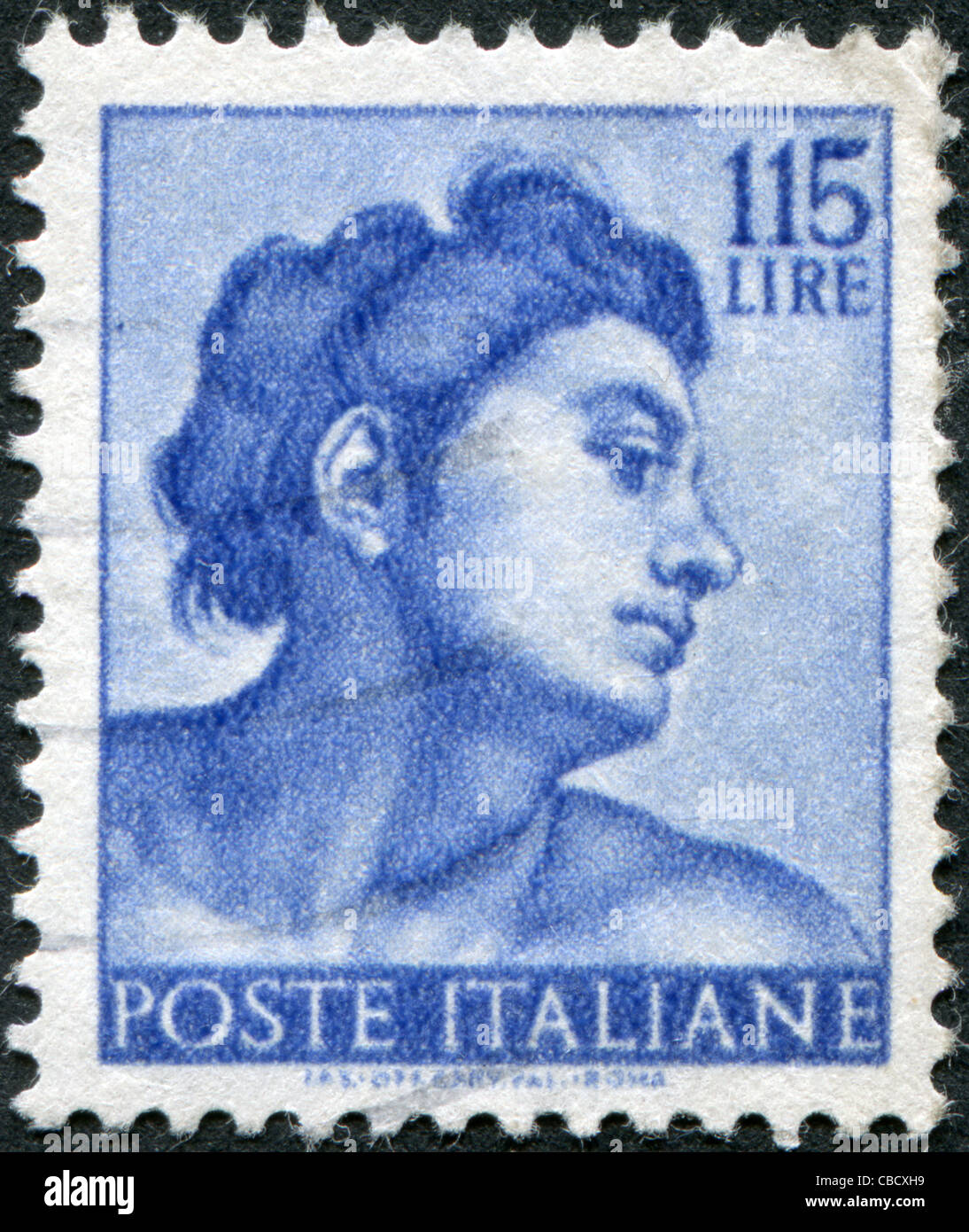 A stamp printed in Italy, shows Designs from Sistine Chapel by Michelangelo, Heads of various 'slaves', circa 1961 Stock Photo