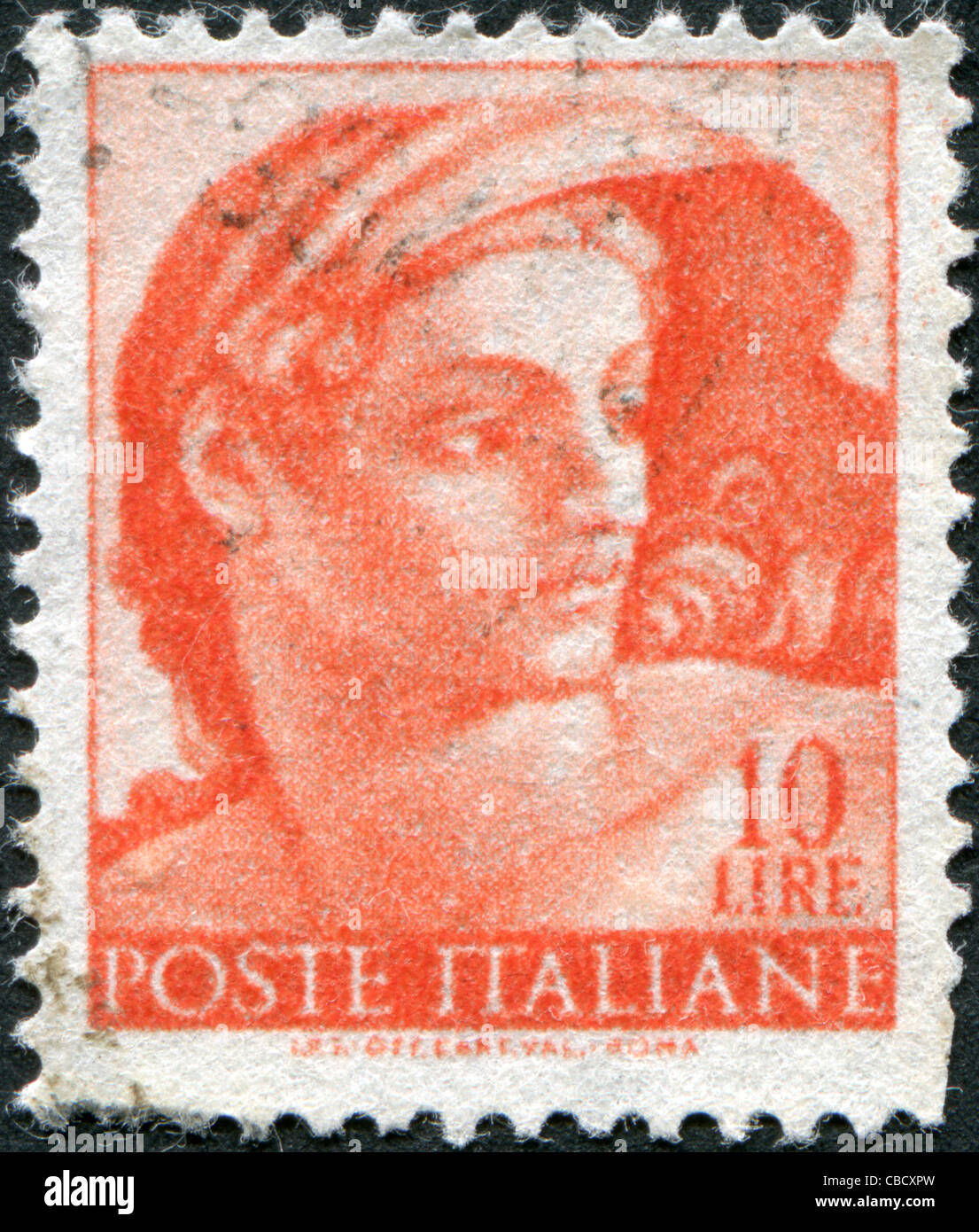 ITALY - CIRCA 1961: A stamp printed in Italy, shows Designs from Sistine Chapel by Michelangelo, Heads of various 'slaves' Stock Photo