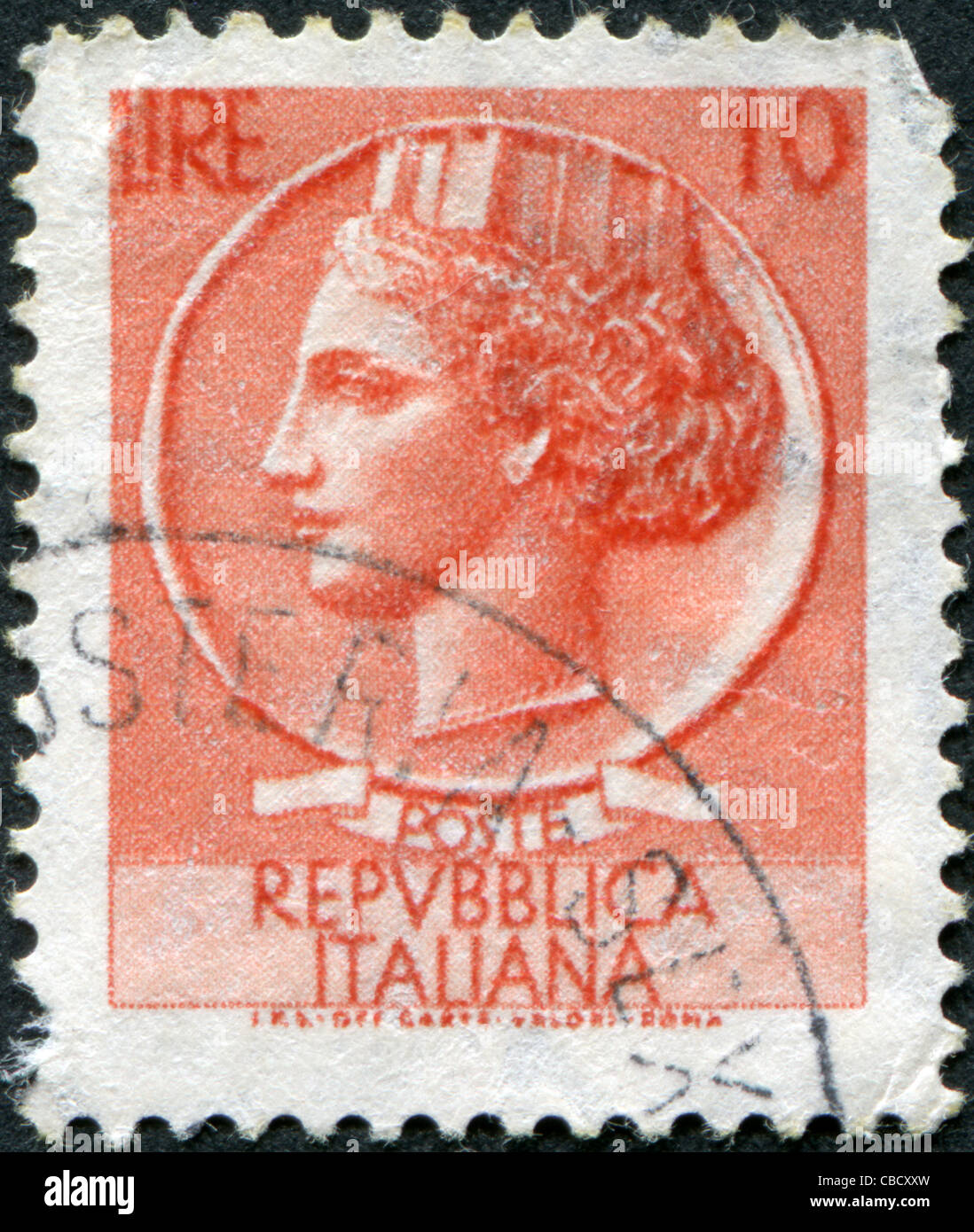 ITALY - CIRCA 1944: A stamp printed in Italy, is shown Italia Turrita after Syracusean Coin, circa 1944 Stock Photo