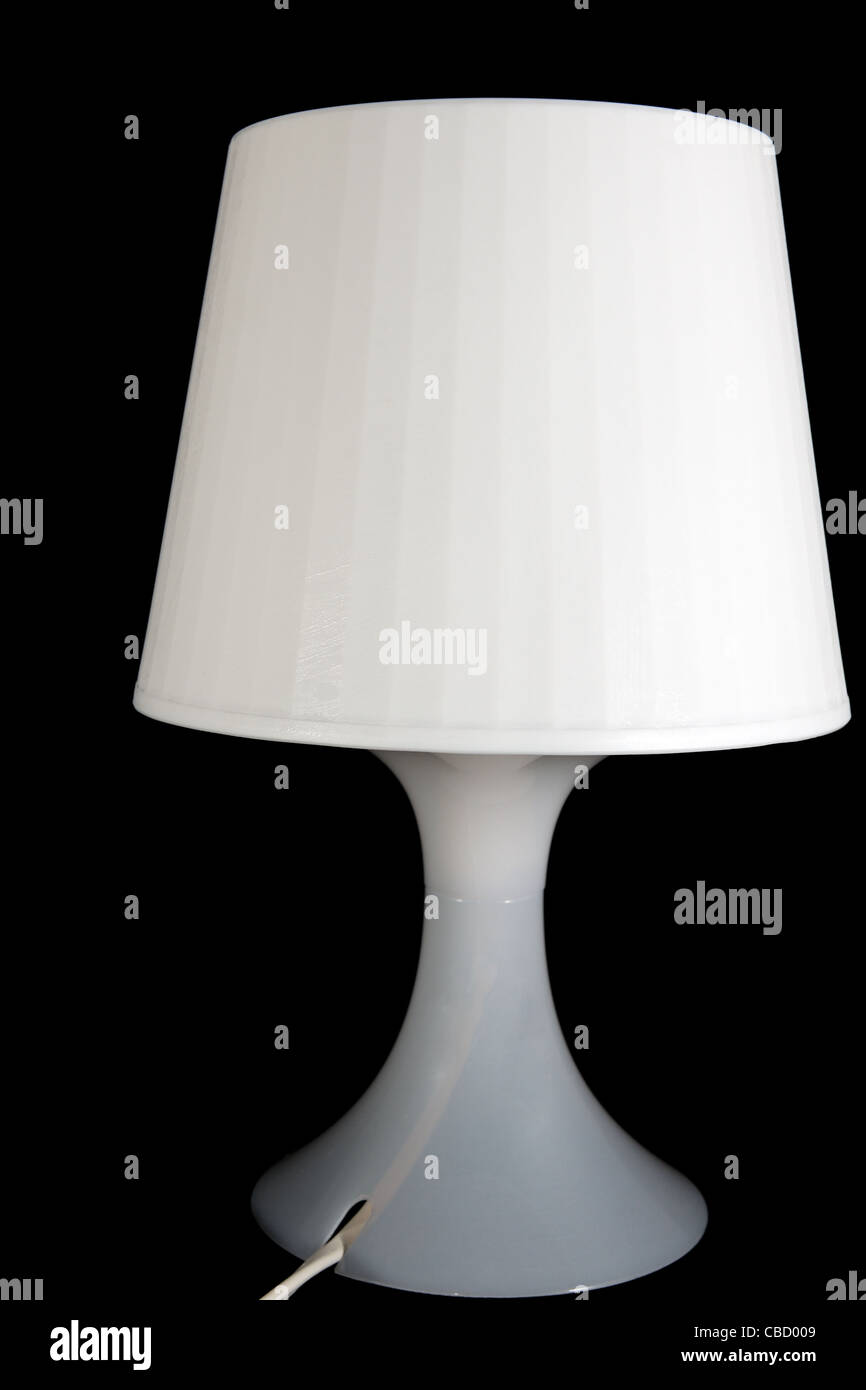 White desk lamp isolated on black background Stock Photo Alamy