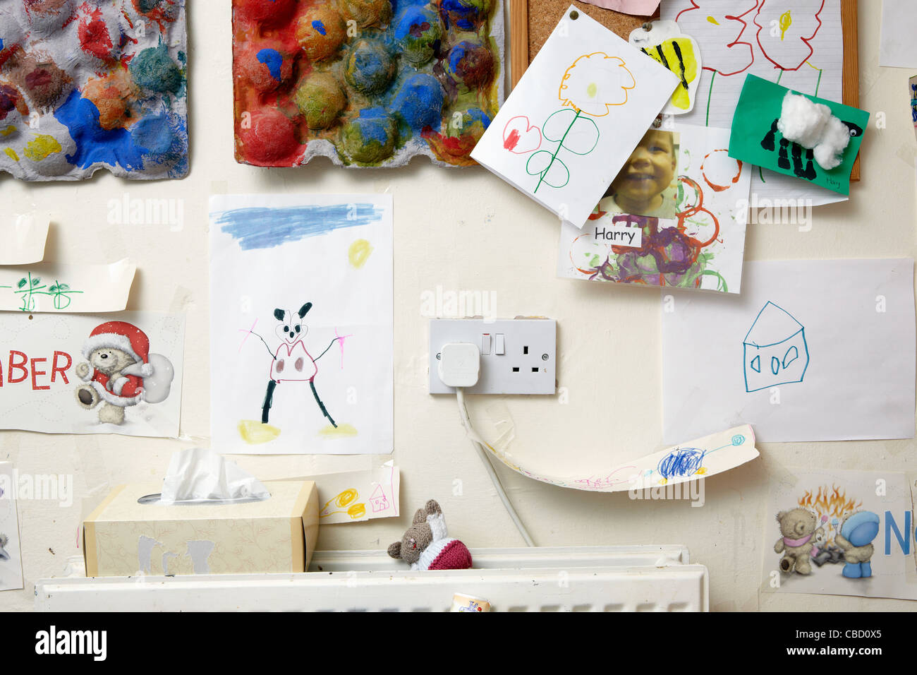 child's art on kitchen wall Stock Photo