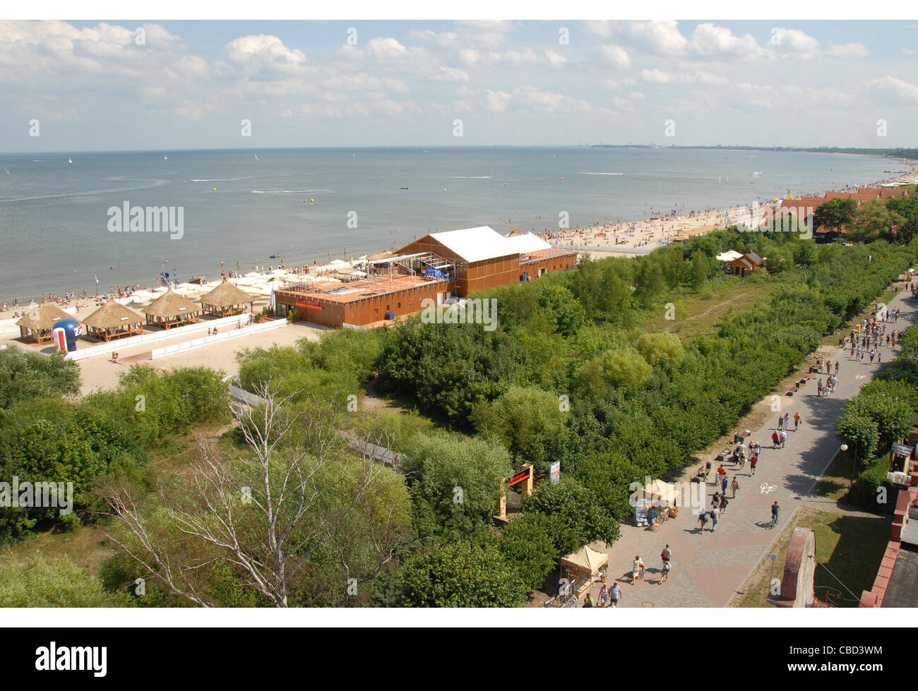 Looking from the lighthouse onto the promenade along the south beach and Baltic Sea shores in the seaside resort Sopot in Pomerania, Poland Stock Photo