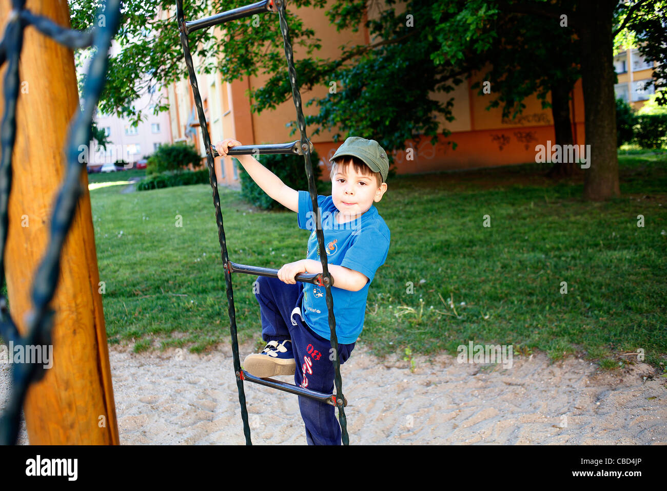 A boy is hanging on a rope ladder. (CTK Photobank / Josef Horazny) Model released, MR Stock Photo